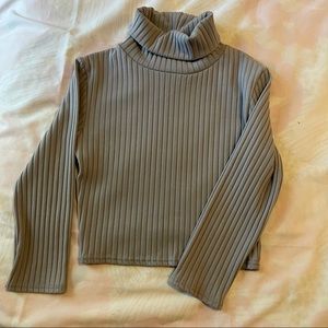 Cropped grey turtleneck top